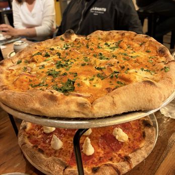 Neony Pizza Works - Special of the day - Butter Chicken Pizza (top), Salami + Hot Honey  (bottom) - Pizza Near Me - Dallas, Texas