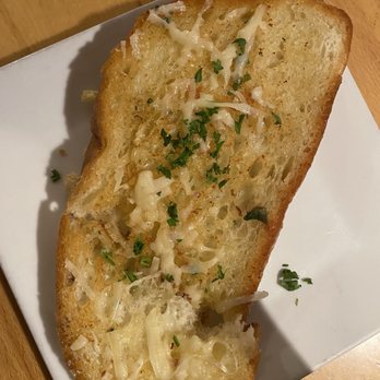 Fandee's Restaurant Sebastopol - Piece of garlic cheese toast - American Near Me - Sebastopol, California