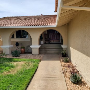 Clean Edge Painting - Front yard after final coats on house and front doort - Painters Near Me