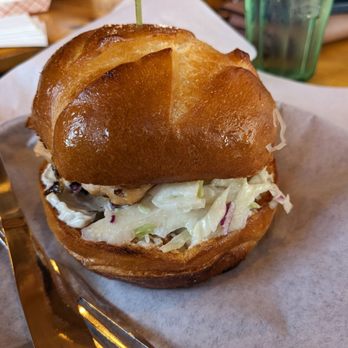 Gustav's - a sandwich on a roll with coleslaw - German Near Me - Leavenworth, Washington