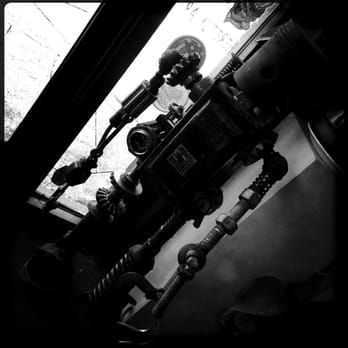 Mutiny Information Cafe - Rock-'em Sock-'em Robot - Coffee & Tea Near Me - Englewood, Colorado