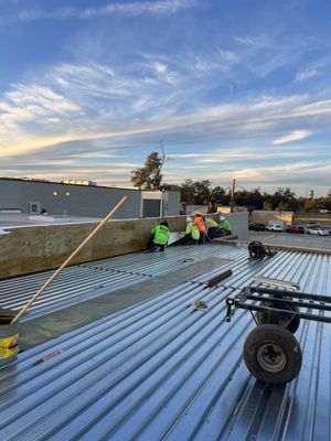 Manzano Construction and Roofing Logo