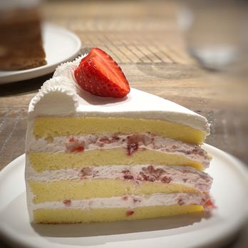 Chicha Restaurant - a slice of cake with strawberries on top - Desserts Near Me - Montreal, Quebec