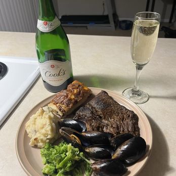 Schnucks Harvester - Homemade surf & turf consisting of beef, broccoli, loaded mashed potatoes, a piece of bread and muscles paired with Cook's champagne. - Grocery Near Me - St Peters, Missouri Schnucks Harvester - Homemade surf & turf consisting of beef, broccoli, loaded mashed potatoes, a piece of bread and muscles paired with Cook's champagne. - Grocery Near Me - St Peters, Missouri