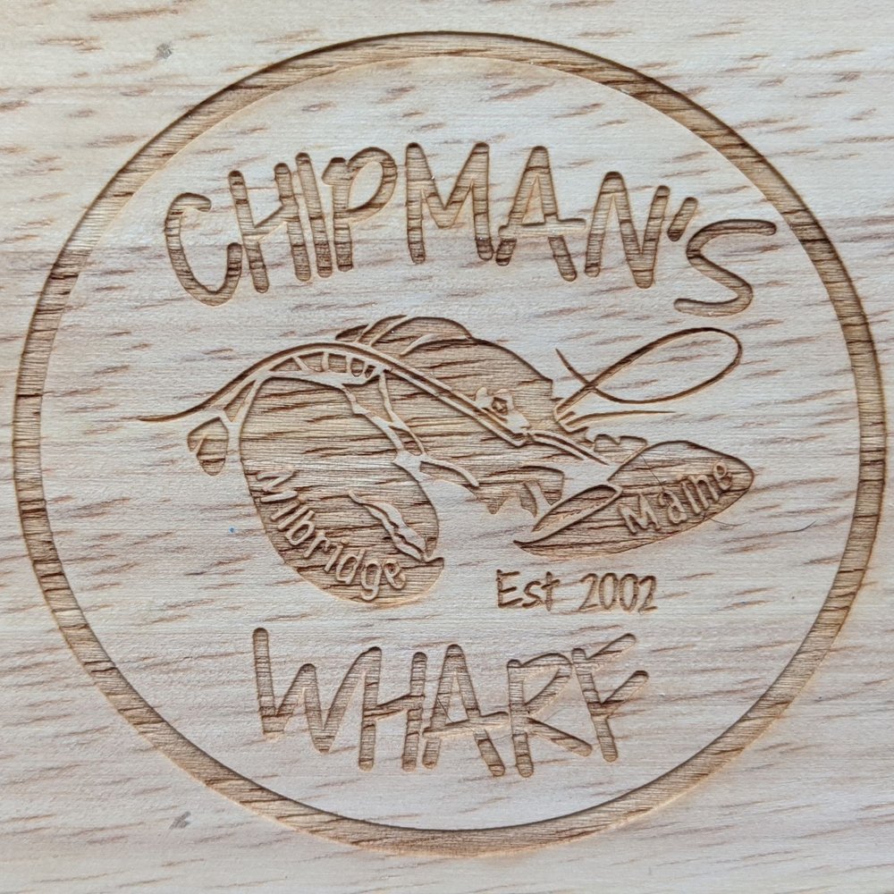 Chipman's Wharf - An oyster shucker - Seafood Markets Near Me - Milbridge, Maine