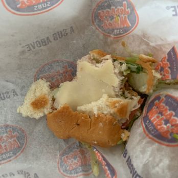 Jersey Mike's Subs - This is the half of Jersey Mike's, if you notice the bread crumb next to the sub. The pieces are scattered about. - Sandwiches Near Me - Palm Beach Gardens, Florida