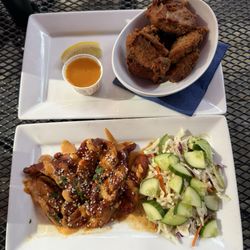The Sherlock Holmes Pub - Marinated chicken thigh pieces with sarrachia mayo sauce. Pork rib was overly dry.