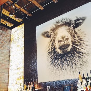 Cultivate Craft Kitchen - The big giant sheep art display above the bar. He purty. - New American Near Me - Draper, Utah