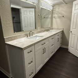 EHS Restoration - New floors, vanity, sinks, counter tops, lights.