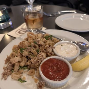 Rickhouse Whiskey Bar - Calamari served with a tasty cocktail sauce (horseradish forward) and a lemon aioli - Whiskey Bars Near Me - Seattle, Washington Rickhouse Whiskey Bar - Calamari served with a tasty cocktail sauce (horseradish forward) and a lemon aioli - Whiskey Bars Near Me - Seattle, Washington