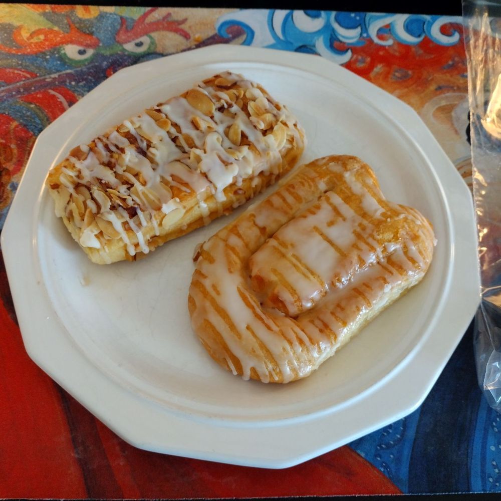 Trefzger's Bakery - Almond paw (left) and plain danish (right). - Bakeries Near Me - Peoria Heights, Illinois Trefzger's Bakery - Almond paw (left) and plain danish (right). - Bakeries Near Me - Peoria Heights, Illinois