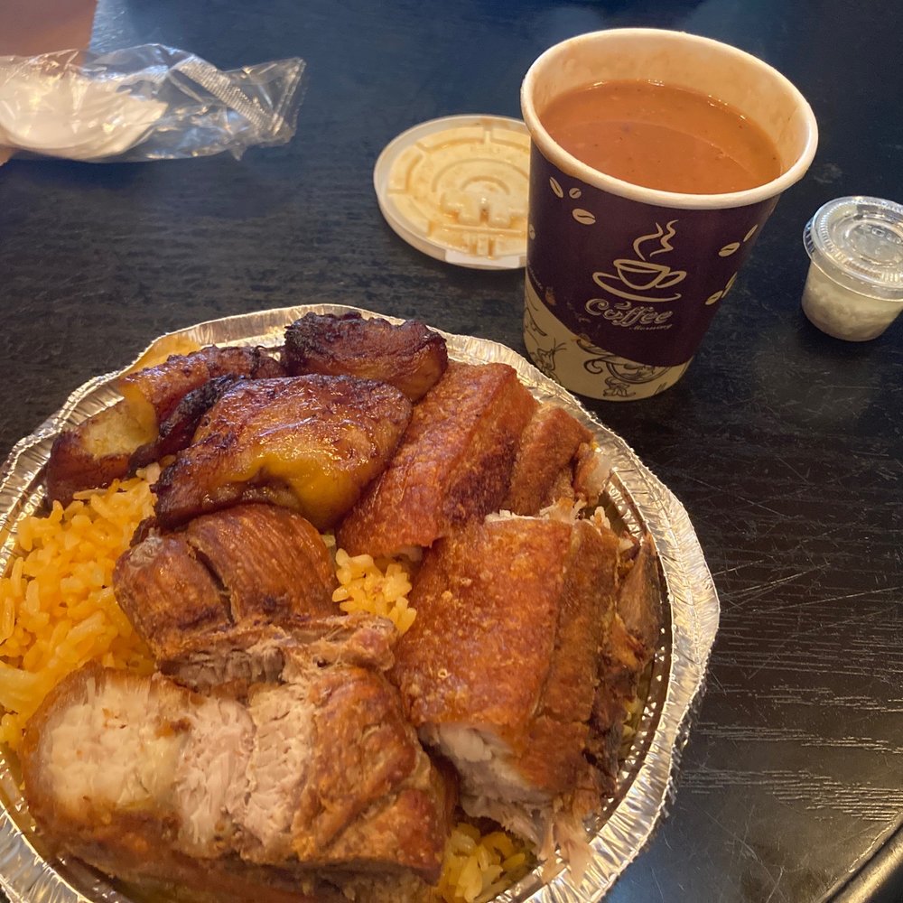 a plate of food and a cup of coffee
