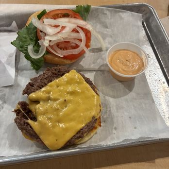Smash and Sizzle - The cash smash with extra burger sauce on the side - Burgers Near Me - High Point, North Carolina