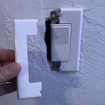 Robinhood Resort - Broken switch plate in main room. - Big Bear Lake, CA