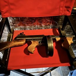 a gun on a chair