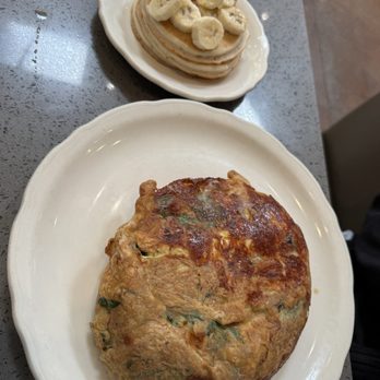 Richard Walker's Pancake House - Baked MEDITERRANEAN OMELETTE WITH CHEESE and side of pancakes - Waffles Near Me - Del Mar, California Richard Walker's Pancake House - Baked MEDITERRANEAN OMELETTE WITH CHEESE and side of pancakes - Waffles Near Me - Del Mar, California