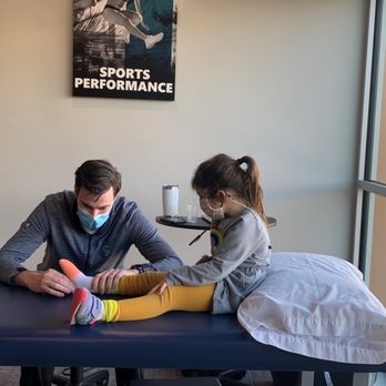 IRG Physical Therapy - Snoqualmie Ridge - IRG's Snoqualmie Ridge director, John Quinn, DPT, treats a 4-year-old girl who is recovering from corrective surgery for club foot. - Physical Therapy Near Me - Snoqualmie, Washington IRG Physical Therapy - Snoqualmie Ridge - IRG's Snoqualmie Ridge director, John Quinn, DPT, treats a 4-year-old girl who is recovering from corrective surgery for club foot. - Physical Therapy Near Me - Snoqualmie, Washington
