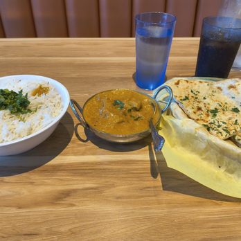 Indian Curry and Grill - Coconut chicken, with garlic naan, with rice, seasoned with cumin seeds! - Indian Near Me - Lodi, California Indian Curry and Grill - Coconut chicken, with garlic naan, with rice, seasoned with cumin seeds! - Indian Near Me - Lodi, California