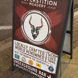 The sandwich board from the outside that directs you TO the meadery The sandwich board from the outside that directs you TO the meadery