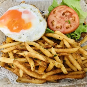 The Royal Peasant - a plate of french fries and a fried egg - British Near Me - Athens, Georgia