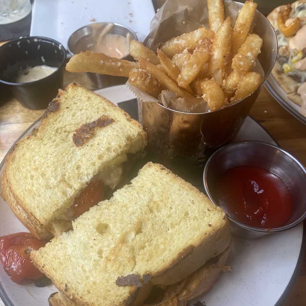 The Stubborn Mule - Pimento grilled cheese sandwich with rosemary Parmesan fries - New American Near Me - Orlando, Florida The Stubborn Mule - Pimento grilled cheese sandwich with rosemary Parmesan fries - New American Near Me - Orlando, Florida