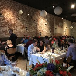 The Space Downtown - Exposed brick wall and wood finishes over the bar give the venue a Downtown C'ville feel.