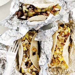 Willie's Catering BBQ and Burgers - Brisket with pickles and onions (top), Sausage egg potato (left), Bacon egg potato (right).