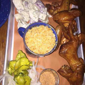 Sweet Cheeks Q - Monster wing platter with potato salad and Mac n cheese - Southern Near Me - Boston, Massachusetts
