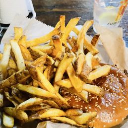 Enjoy a gourmet burger accompanied by freshly prepared potato fries. Enjoy a gourmet burger accompanied by freshly prepared potato fries.