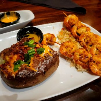 LongHorn Steakhouse - 12 Shrimp over rice and baked potato - Steakhouses Near Me - Roswell, Georgia LongHorn Steakhouse - 12 Shrimp over rice and baked potato - Steakhouses Near Me - Roswell, Georgia