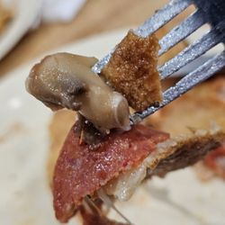 New York Pizza - Close-up of some of the ingredients of the Italian Stuffed Pizza.