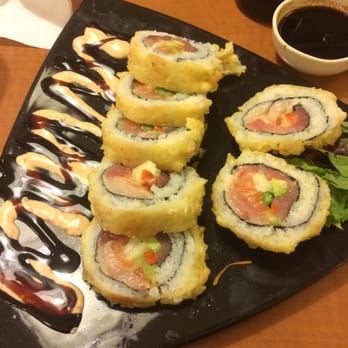 Goleta Sushi House - Dynamite Roll: yellowtail, tuna, salmon, asparagus, gobo, cucumber, avocado inside; tempura outside. - Sushi Bars Near Me - Goleta, California Goleta Sushi House - Dynamite Roll: yellowtail, tuna, salmon, asparagus, gobo, cucumber, avocado inside; tempura outside. - Sushi Bars Near Me - Goleta, California