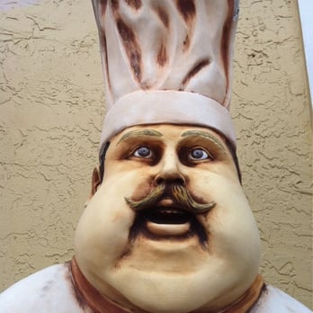 67 Liquor Shop - a statue of a chef - Beer, Wine & Spirits Near Me - Lighthouse Point, Florida