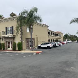 Holistic Physical Therapy and Wellness - Park in the back of the building that faces the ocean. Stairs and an elevator are located on the back, north side of the building.