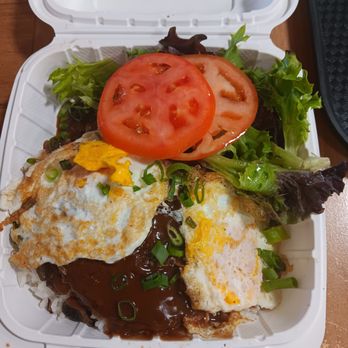 Kualoa Ranch - The Moco Loco (2 beef patties over rice, smothered gravy w/ 2 eggs over easy) w/ tossed greens. This is a popular dish in Hawaii. - Tours Near Me - Kaneohe, Hawaii