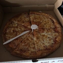 Cheese pizza large 8 slices. Smaller than expected. See knife for size comparison.