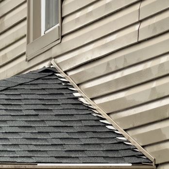 Husbands Helpers - Improperly laid old flashing between new shingles. - General Contractors Near Me - York, Pennsylvania