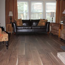 Simas Floor & Design Company - Mannington Laminate, Sawmill Hickory, Color: Leather installed by Simas