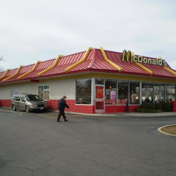 McDonald's - a man walking in front of a mcdonald's - Fast Food Near Me - Greenwood, South Carolina McDonald's - a man walking in front of a mcdonald's - Fast Food Near Me - Greenwood, South Carolina