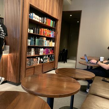Starbucks - a man using a laptop in a coffee shop - Coffee & Tea Near Me - Frisco, Texas