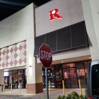 Rum Jungle - a stop sign in front of a store - Cocktail Bars Near Me - Orlando, Florida Rum Jungle - a stop sign in front of a store - Cocktail Bars Near Me - Orlando, Florida