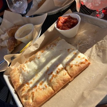 South Bend Brew Werks - Cheesy Bread with the Pretzel in the background! - Breakfast & Brunch Near Me - South Bend, Indiana South Bend Brew Werks - Cheesy Bread with the Pretzel in the background! - Breakfast & Brunch Near Me - South Bend, Indiana