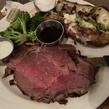 Triple 7 Restaurant and Microbrewery - Prime Rib (rare) with Baked Potato - American Near Me - Las Vegas, Nevada Triple 7 Restaurant and Microbrewery - Prime Rib (rare) with Baked Potato - American Near Me - Las Vegas, Nevada