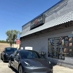 Tesla Supercharger - Plugged in and juicing up