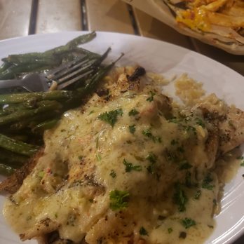 Doc's Seafood & Steaks - Crab stuffed flounder with green beans over Doc's rice. - Seafood Near Me - Corpus Christi, Texas Doc's Seafood & Steaks - Crab stuffed flounder with green beans over Doc's rice. - Seafood Near Me - Corpus Christi, Texas