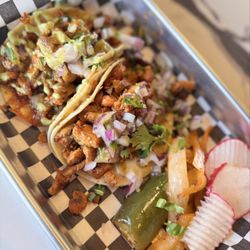 Tequileros Taqueria - One chicken street taco & one pastor Taco Tequilero