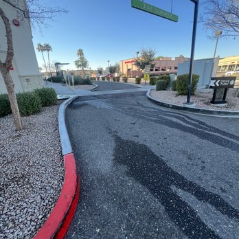 Starbucks - The curve of the drive through going up a hill so you can't see the curb - Coffee & Tea Near Me - Gilbert, Arizona Starbucks - The curve of the drive through going up a hill so you can't see the curb - Coffee & Tea Near Me - Gilbert, Arizona