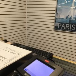US Post Office - They take cash, check, debit. And They print the official money order here.