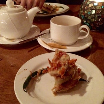 Soby's - Tea and half of a fried green tomatoes appetizer. - New American Near Me - Greenville, South Carolina Soby's - Tea and half of a fried green tomatoes appetizer. - New American Near Me - Greenville, South Carolina