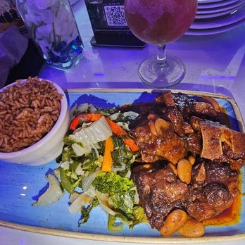 The Simpson Restaurant & Bar - BK - Oxtails served with rice and peas and vegetables - Caribbean Near Me - Brooklyn, New York